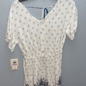 white dress with blue flower pattern